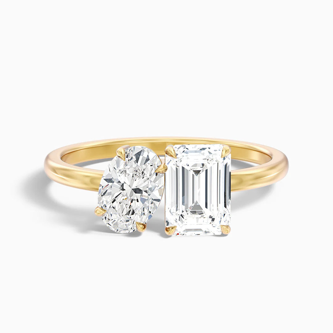 Toi and Moi Emerald and Oval Engagement Ring